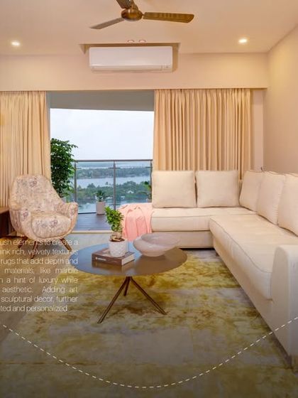 Luxurious living with a view. This living room design maximizes light and space, creating an open, airy, and sophisticated environment.