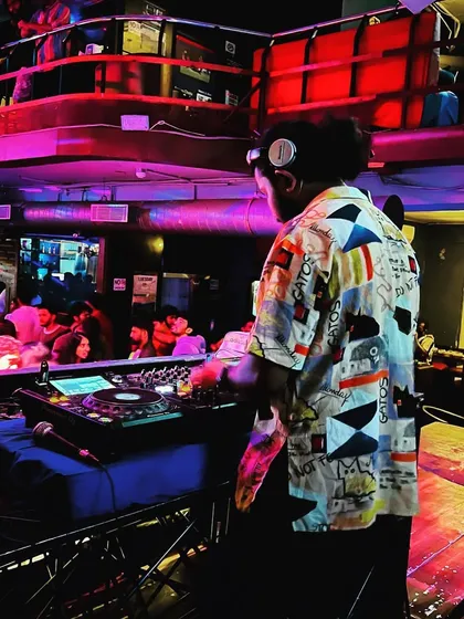 These shots capture me in my element, from different angles and at various events. Each one is a glimpse into my life as a music maker, focused on the craft and connecting with the crowd.