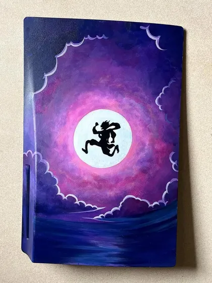 The other side of the 'One Piece' PS5, showing Luffy's Gear 5 silhouette against the moon.