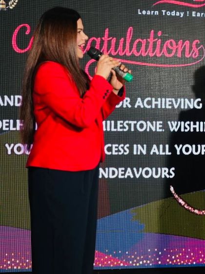 Addressing the achievers at the Skills Bazzar Premium League awards. I make sure every winner feels celebrated as they come up to the stage.