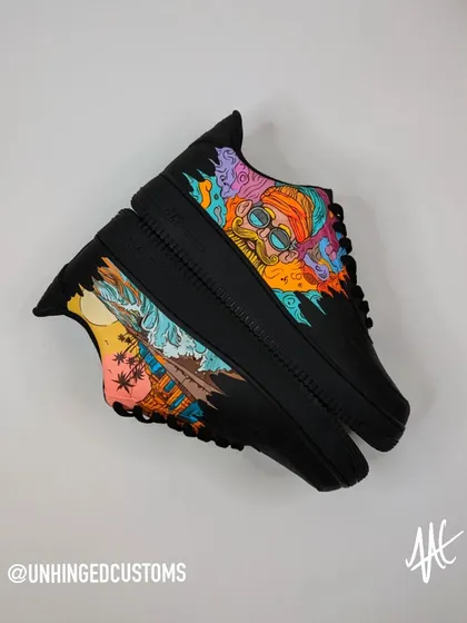 A full view of the "2 States" custom AF1s. The vibrant, colorful art looks amazing against the all-black sneaker.