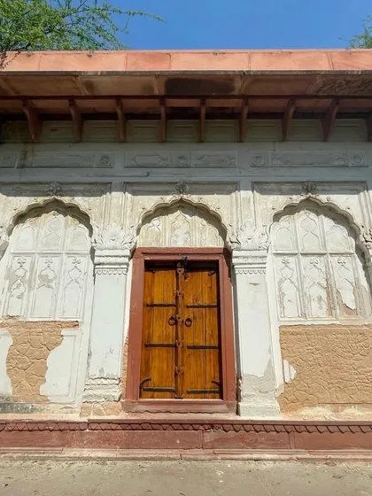 The elegant facade of a Mughal-era tomb in Sunder Nursery. The restoration work by the Aga Khan Trust for Culture has brought these monuments back to life.