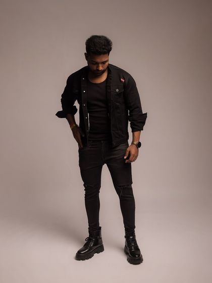 A full-length standing shot that provides a clear view of the model's proportions and the complete outfit.