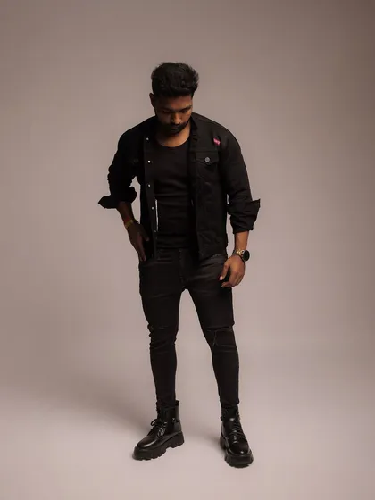 A full-length standing shot that provides a clear view of the model's proportions and the complete outfit.