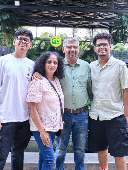 A happy family posing for a photo. It's a joy to host families and be a part of their special outings.