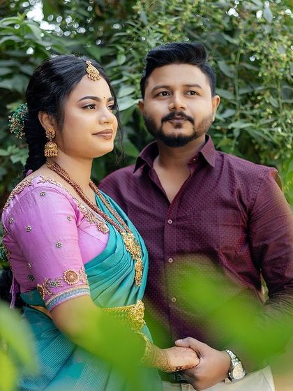 An outdoor portrait of my bride Sugirtha and her groom at their engagement. Her makeup is fresh and natural, perfect for the daytime event.