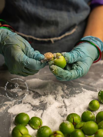 Before stuffing, each gunda is filled with salt to draw out moisture and begin the curing process. It's a crucial step in creating our authentic pickle.