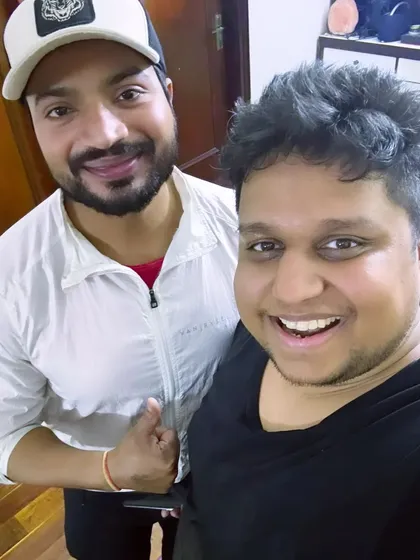 A selfie with a smiling client after a tough but rewarding gym session. Seeing my clients happy with their progress is the best part of my job.