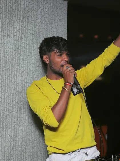 A powerful shot of me on the mic, commanding the dance floor.