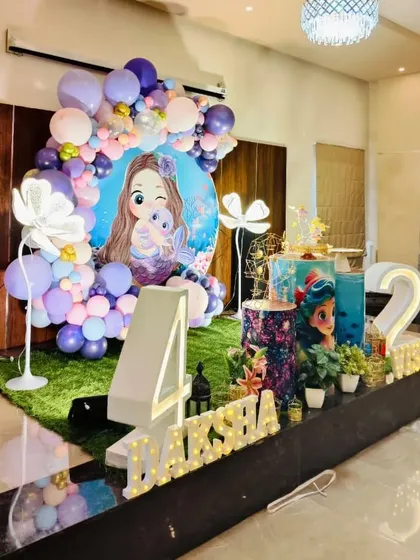 A side-angle view of the mermaid party stage, showing how it fits into the room.