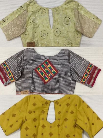 A collection of three ready-made blouses, each with a unique personality. From a lime green blouse with mirror work to a simple yellow Kasuti piece, there is something for every taste.