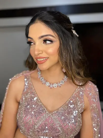 A radiant smile from Hetal, showing her confidence in her sangeet look.