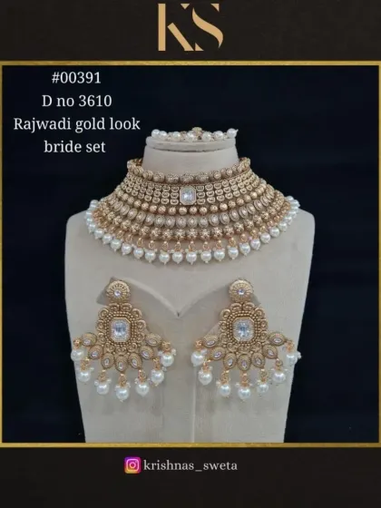 The classic all-white pearl and stone version of our Rajwadi bridal set. This is a versatile and elegant choice that can be paired with any color of outfit.