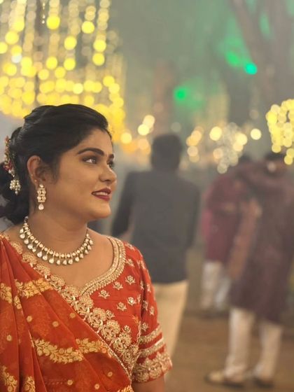 A candid shot of our client at her event. Our rental outfits help you create beautiful memories without the high cost.