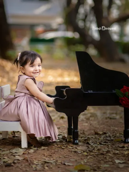 Music, smiles, and a heart full of dreams. This little pianist is lost in her own beautiful melody.