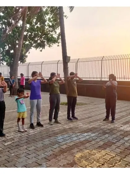 We start every summer camp session with warm-up exercises to prepare the body and mind for archery.