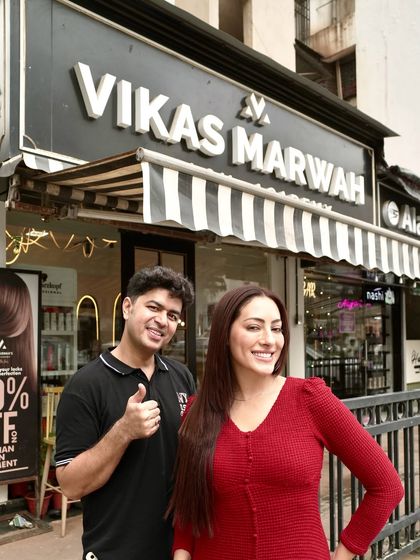 A happy client is the best result. Here she is outside my salon, showing off her glowing, transformed hair. It's not just a new style, it's a boost of confidence.