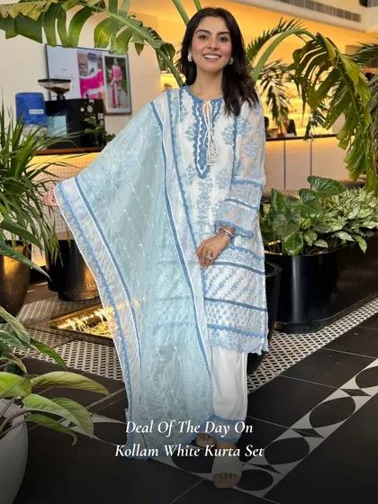 My Kollam White Kurta Set features a beautiful blue print and delicate embroidery. It's a fresh and breezy option for any casual outing.