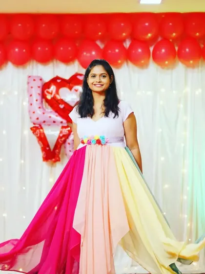 Add a splash of color to your celebration with my rainbow gown. This fun and vibrant dress is perfect for candy-themed birthday parties, cheerful maternity shoots, or any event where you want to stand out.