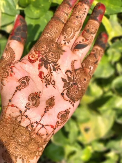 The same Arabic design, captured in bright sunlight. The natural light really makes the details of the floral and paisley patterns stand out.