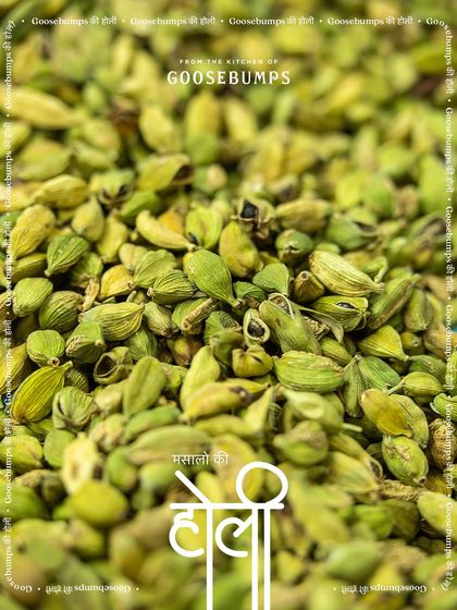 A vibrant celebration of spices in my kitchen, like a 'Masalo ki Holi'. Here is a beautiful pile of green cardamom pods, one of the many aromatic ingredients I use in my blends.