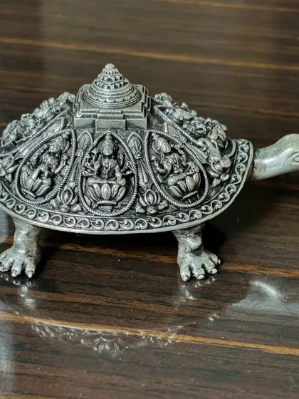 Another perspective of our lucky silver tortoise. This piece is heavy and detailed, believed to bring good fortune and positive energy to any home or office.