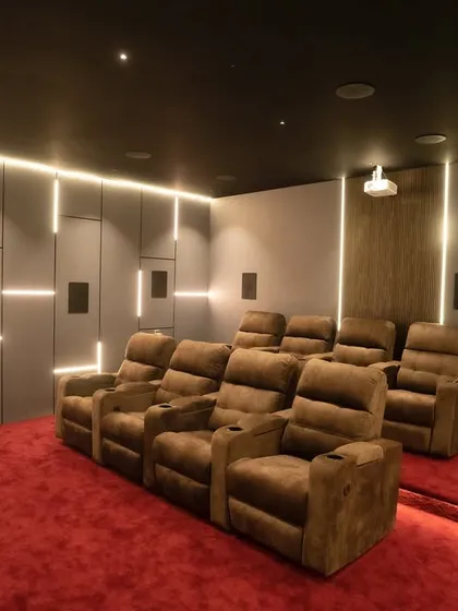 A look at a 9.1.4 luxury home cinema in Thirunagar, Madurai, designed for the ultimate audiophile. This setup features a full suite of OSD and REL speakers, powered by an ANTHEM MRX 1140 receiver, delivering a precise and powerful Dolby Atmos soundscape.