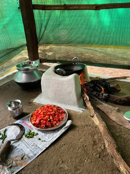 A simple, efficient, and sustainable cooking setup. The traditional 'chulha' or stove, ready for making the meal that brought us all together.