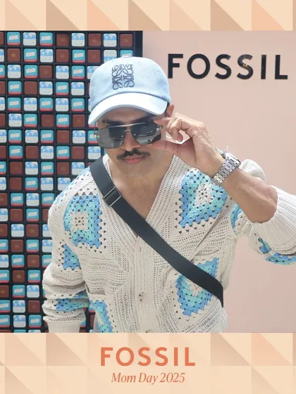 A male fashion influencer looking cool at the Fossil brand event. Our service caters to a diverse audience, ensuring everyone has a great time.