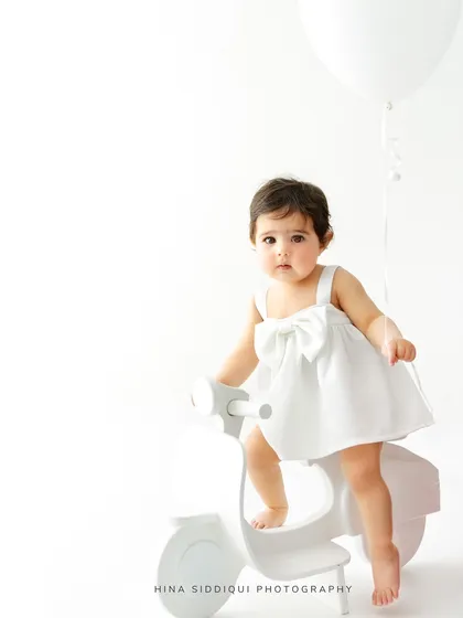 A slightly different perspective of the scooter shot, capturing a sweet, curious glance. My baby led approach means we follow their lead, resulting in natural and authentic moments.