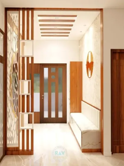 A glimpse into a well-designed foyer and passage, featuring a CNC-cut partition and a comfortable seating nook. The design balances modern aesthetics with functional elements.