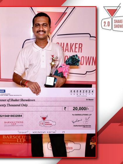The winner of Shaker Showdown 2.0 holding his prize. We are committed to investing in the future of bartending.