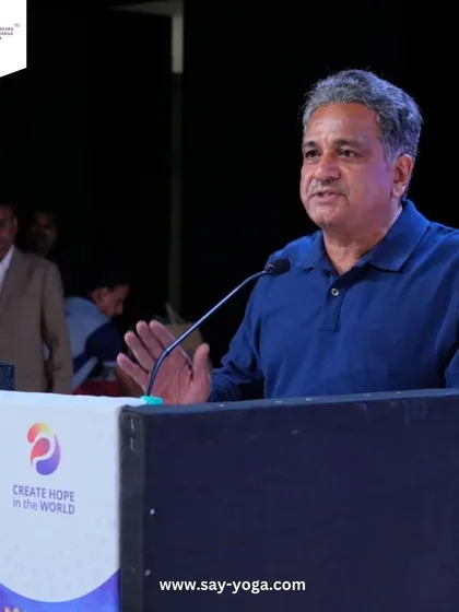 Our founder, Mr. Chandrashekar, speaking at the Rotary International event. His passion for sharing the wisdom of yoga is an inspiration to our entire community.