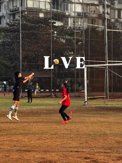 A young player jumps to head the ball, demonstrating the advanced skills we teach. Our coaching is designed to help every child grow, from learning the basics to mastering complex techniques.