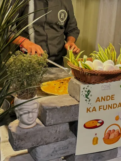 A closer view of our "Ande Ka Funda" live egg station, showcasing the fresh ingredients and rustic-chic setup. This station is always a hit, offering guests a simple yet satisfying culinary experience.