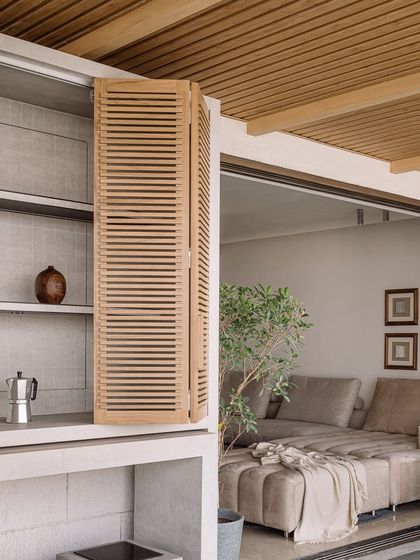 A view from the living room out to the deck, showing the seamless connection between indoor and outdoor spaces.