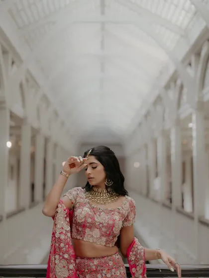 Another stunning portrait of Nandini in the grand corridor of the Taj Mahal Palace. Her pose and the leading lines of the architecture create a powerful and visually striking image.