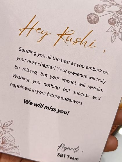 The personalized farewell card for Rushi, wishing him success in his next chapter from the entire team.