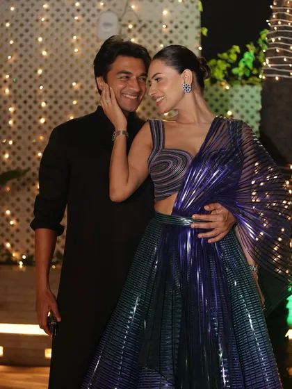 A showstopper look for an event night. This couple shot shows how a clean, elegant makeup look can be both romantic and glamorous.