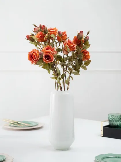 Another tablescape variation for Nestroots, this time with orange roses and green glassware to demonstrate how the same core products can fit different color schemes.
