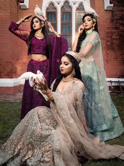 A creative group shot showcasing three different lehengas available for rent. Perfect inspiration for a stylish and coordinated bridesmaid photoshoot.