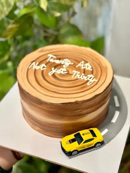 The full view of the "Twenty Ate" cake, a creative and humorous design for a 28th birthday.