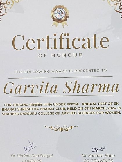 A close-up of the Certificate of Honour presented to me by the Ek Bharat Shreshtha Bharat Club of Shaheed Rajguru College. I hold these tokens of appreciation with great respect and gratitude.