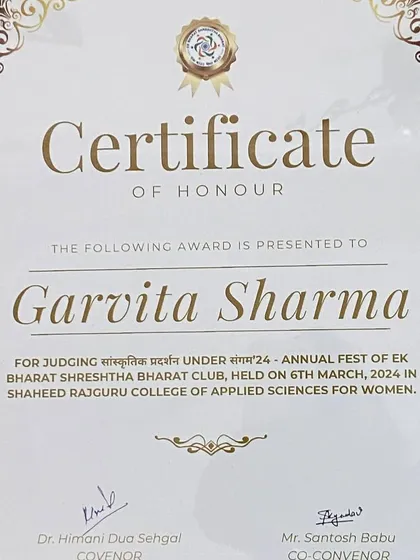 A close-up of the Certificate of Honour presented to me by the Ek Bharat Shreshtha Bharat Club of Shaheed Rajguru College. I hold these tokens of appreciation with great respect and gratitude.