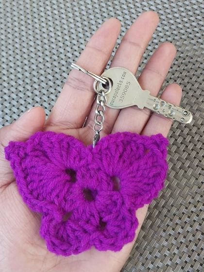 A cute and simple butterfly keychain in a vibrant purple. The colors can be customized to your favorite shade.