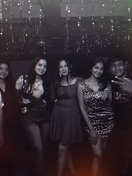Posing for a group photo with friends and fans during the 'Haseen Raat' event. These are the connections that make the night special.