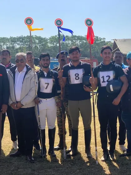 The team assembled at the Junior National Equestrian Championship. Each rider is identified by their number, ready for competition.