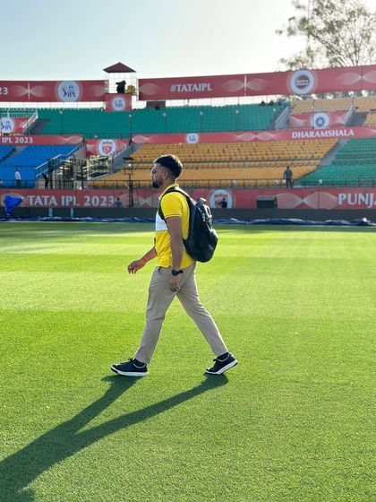 Stronger day by day. Walking across the outfield at Dharamsala during the IPL, feeling energized by the environment.