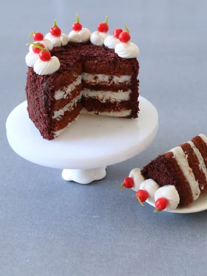 A close-up of a slice of my miniature red velvet cake, showing the perfect layers.
