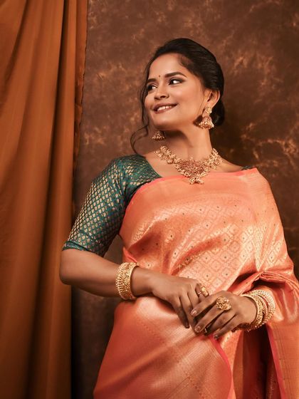 This portrait highlights the exquisite temple jewelry and the fine details of the silk saree I chose for Sharayu Date.